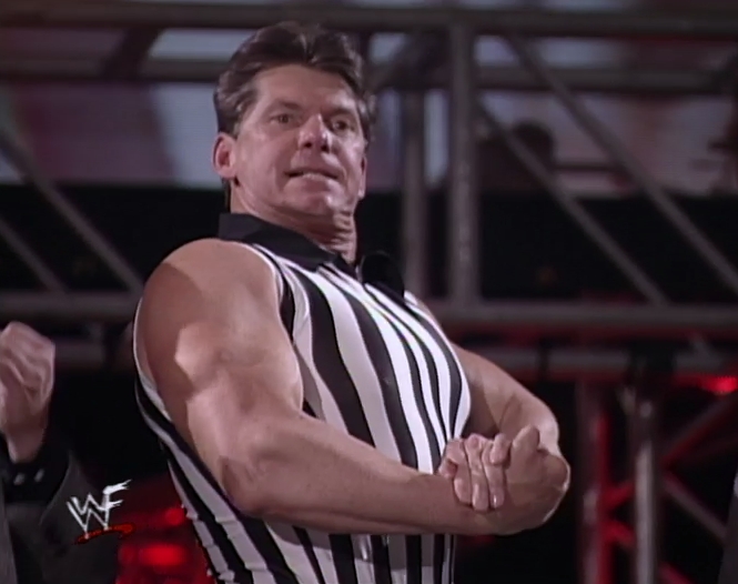 vince-mcmahon-side-chest-pose.jpg