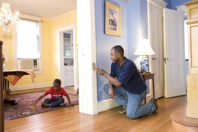 home-repair-diy-carpentry-dad-fixing-door-frame_getty-fullsized