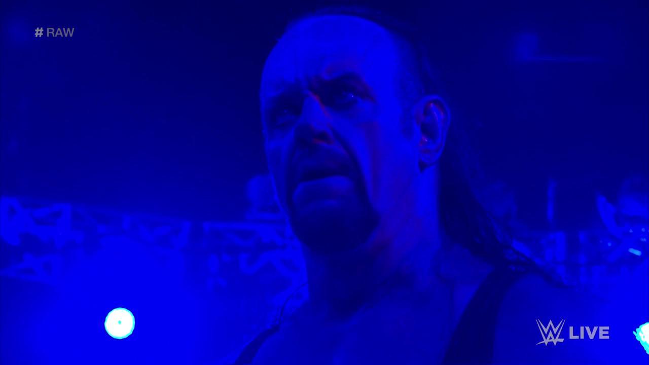 VIDEO Undertaker Returns On WWE Raw, Saves Roman Reigns