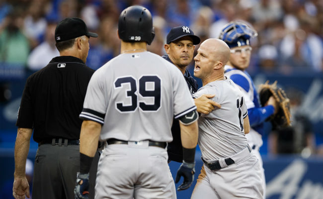 Bret Boone responds to viral ejection of Yankees' Aaron Boone