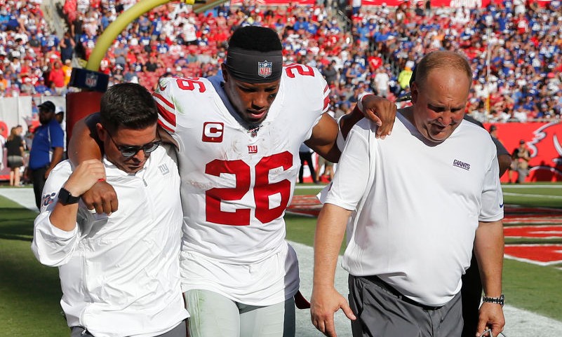 Giants RB Saquon Barkley (ankle) helped off field, Sports