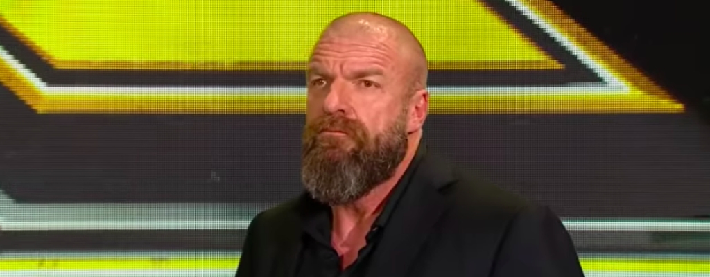 triple-h-nxt-stage-yellow-background-wwe-2019.jpg