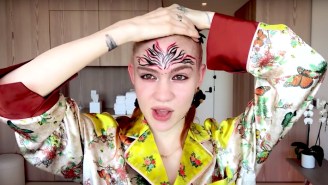 Grimes Shows How To Look ‘Pretty But Ravaged By War’ In A Makeup Tutorial On ‘Vogue’