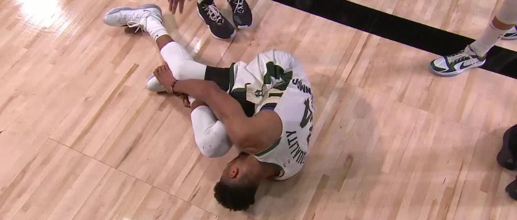 Giannis-holding-ankle-top.jpg
