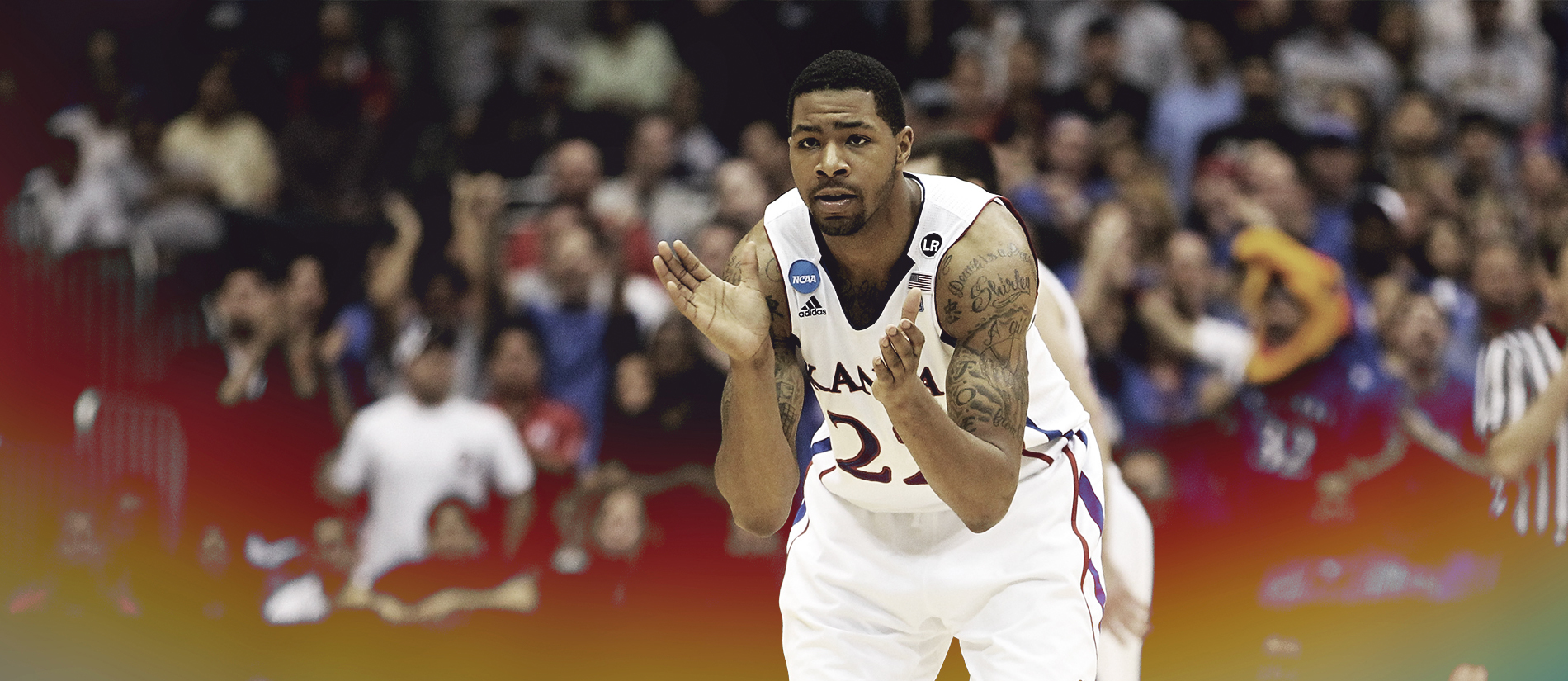 Kansas' Markieff Morris (21) with his twin brother Marcus Morris, left,  during the second half of an NCAA college basketball game against La Salle  Saturday, Dec. 12, 2009 in Kansas City, Mo. (