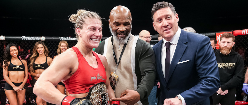 Iconic-Mike-Tyson-handing-out-PFL-2019-Championship-Belts.jpg