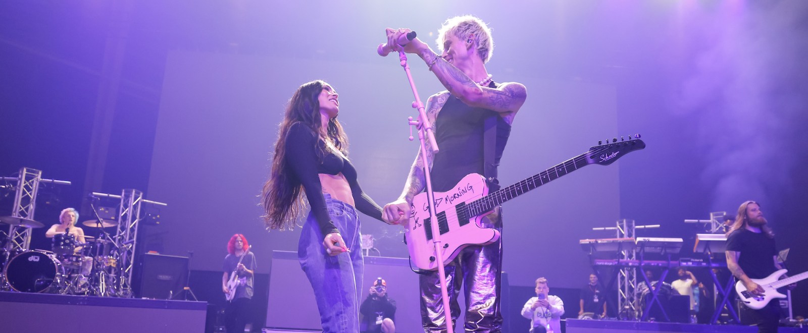 Megan Fox Joined Machine Gun Kelly On Stage And Shared A Smoke At An Indy 500 Concert - machine gun kelly camila cabello bad things roblox id