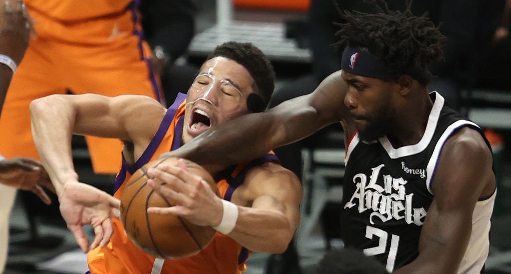Devin Booker, Chris Paul combine for 60 as Suns hold off short