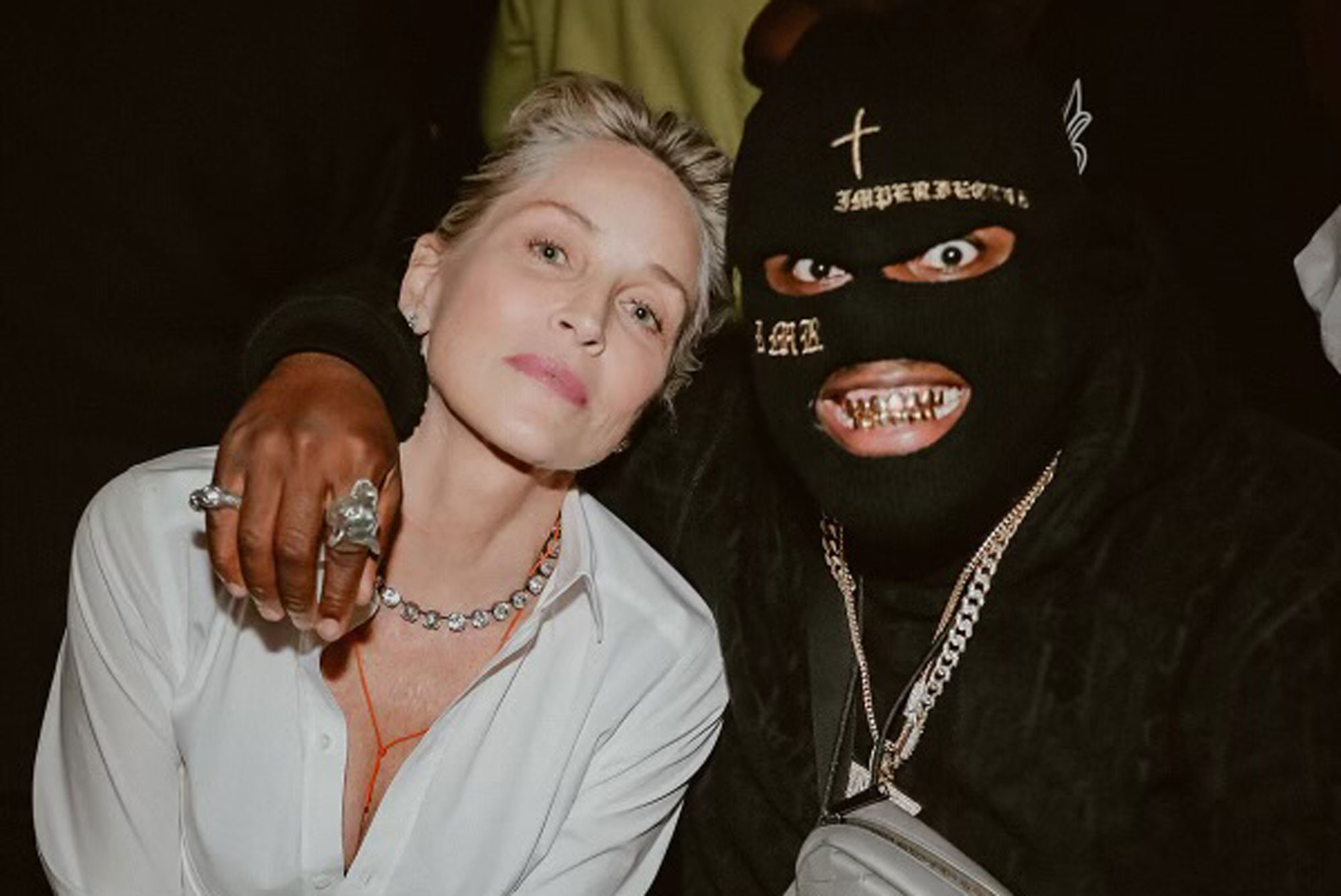 RMR And Sharon Stone Spark Dating Rumors After She Wears His Mask