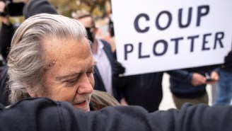 Steve Bannon Surrendered To The FBI On Contempt Charges, And People Can’t Stop Talking About That ‘Coup Plotter’ Sign In The Background