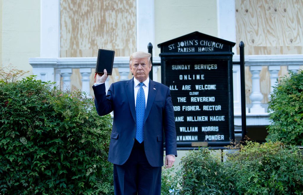 Donald Trump holds a Bible while visiting St. John's Church across from the White House after the area was cleared of people protesting the death of George Floyd June 1, 2020, in Washington, DC