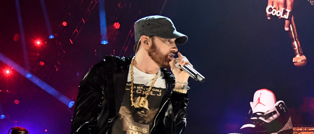 why did the super bowl asked eminem not to kneel