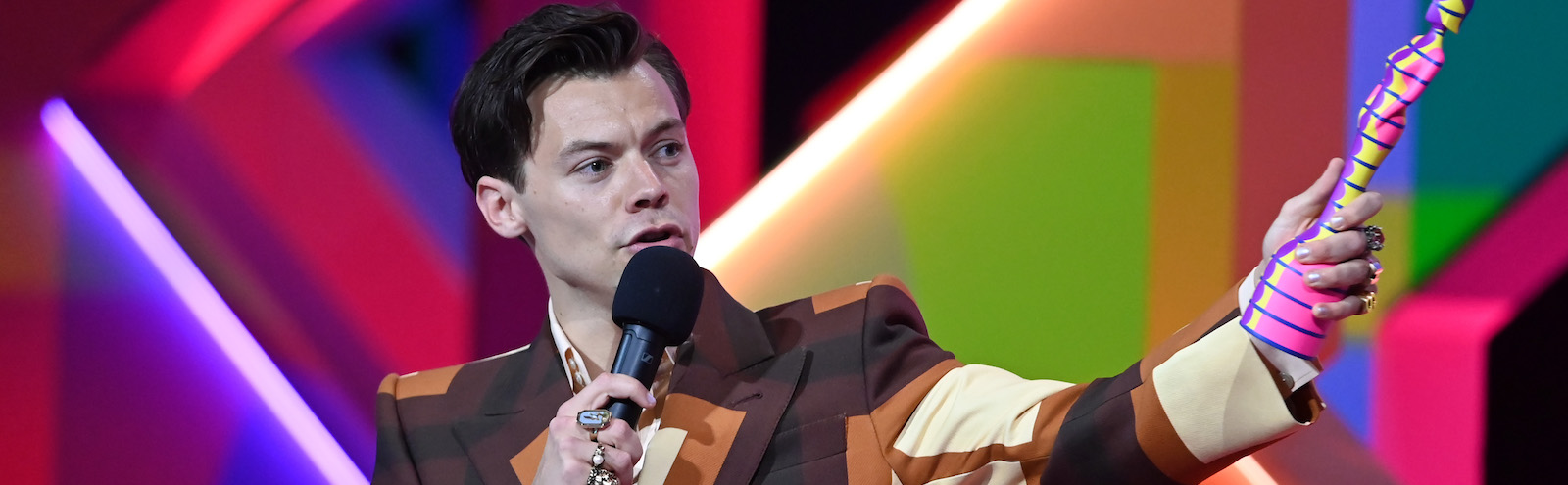 Harry Styles fan sues venue crowd surge