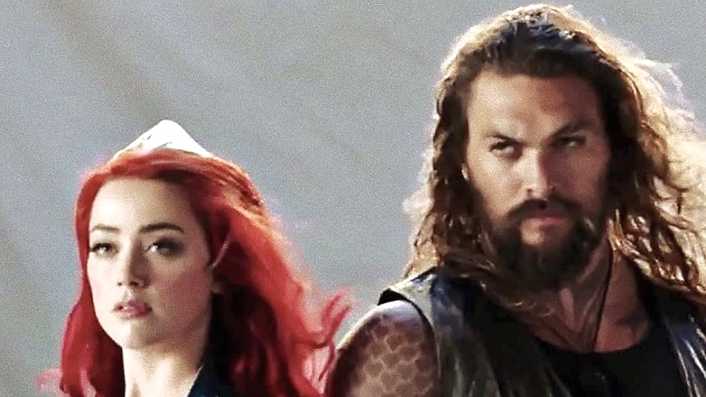 Amber Heard and Jason Momoa in 'Aquaman' (2018).