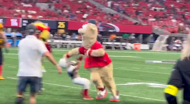 Why did the cheese mascot decide to stiff-arm a kid?