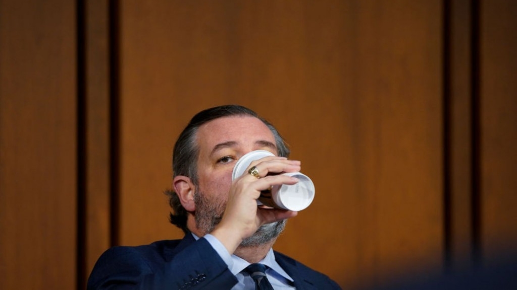 Ted Cruz drinking a cup of coffee
