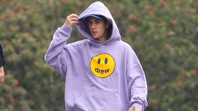 Justin Bieber drapes his body in Drew House while enjoying a hike