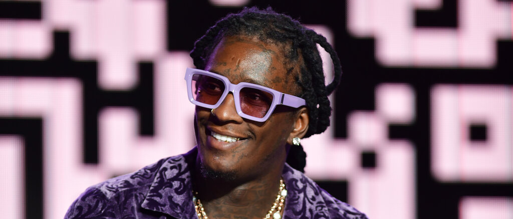 Rapper Wearing Purple Brand
