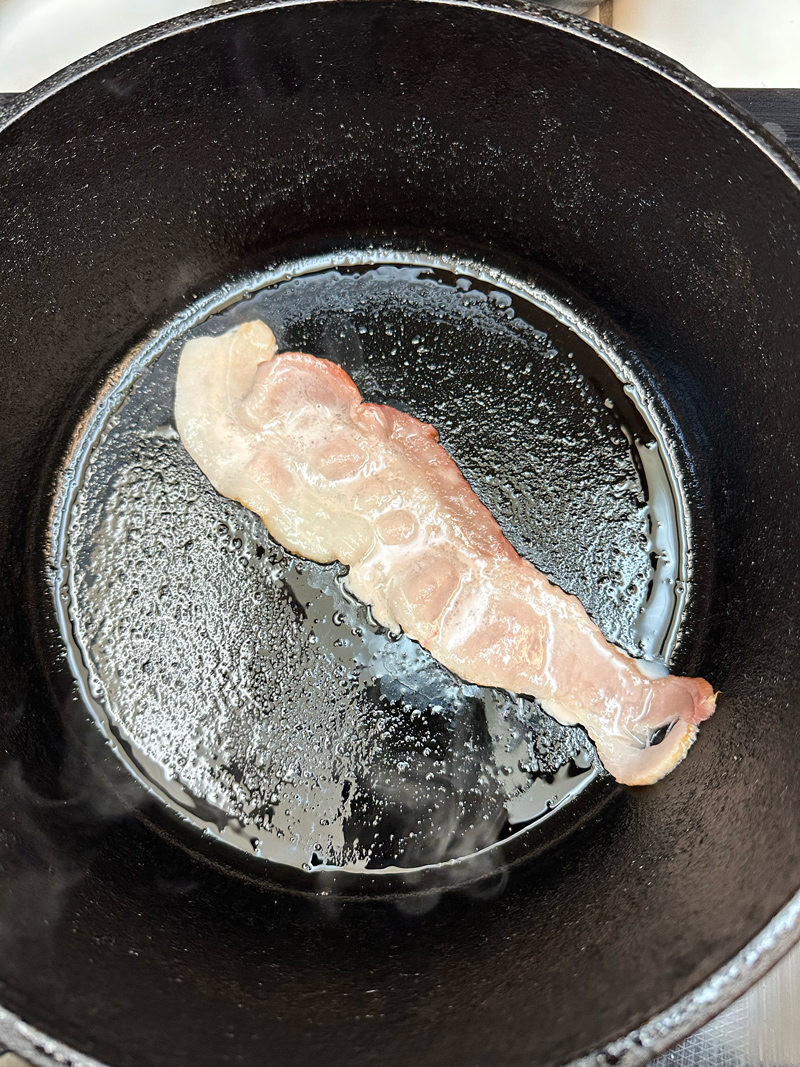 Bacon cooking in dry pan