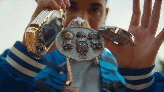 Drake’s ‘Jumbotron Sh*t Poppin’ Video Features Mike Tyson, $3 Million Worth Of Pharrell’s Jewelry, And A Gold PSP