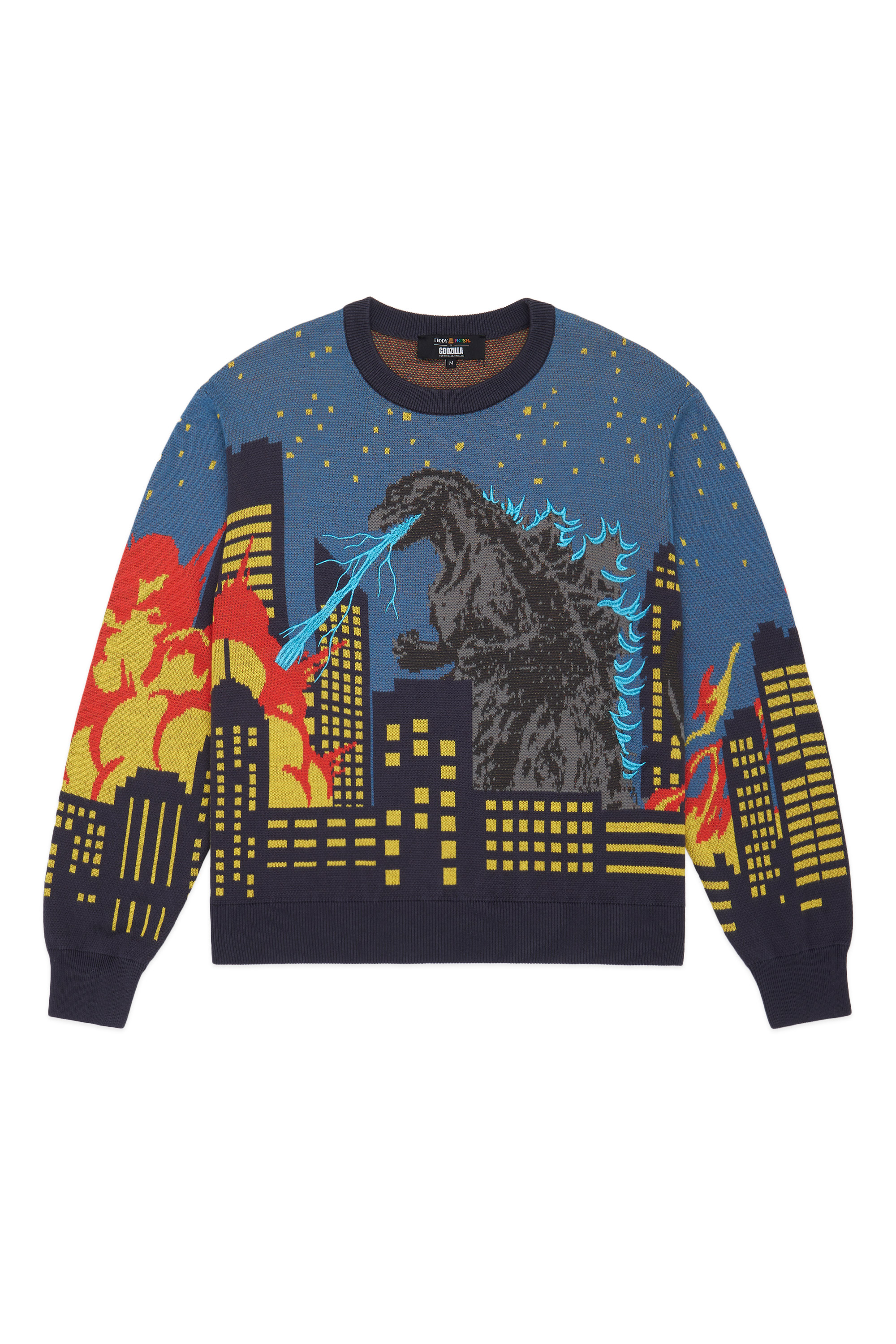 https://uproxx.com/wp-content/uploads/2023/03/TF23SW08-TF-X-GODZILLA-CITYSCAPE-SWEATER-FRONT.jpg