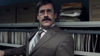 Jon Hamm Plays A Bushy-Mustached, Paranoid Office Worker In The Bizarre-Looking ‘Corner Office’ Trailer