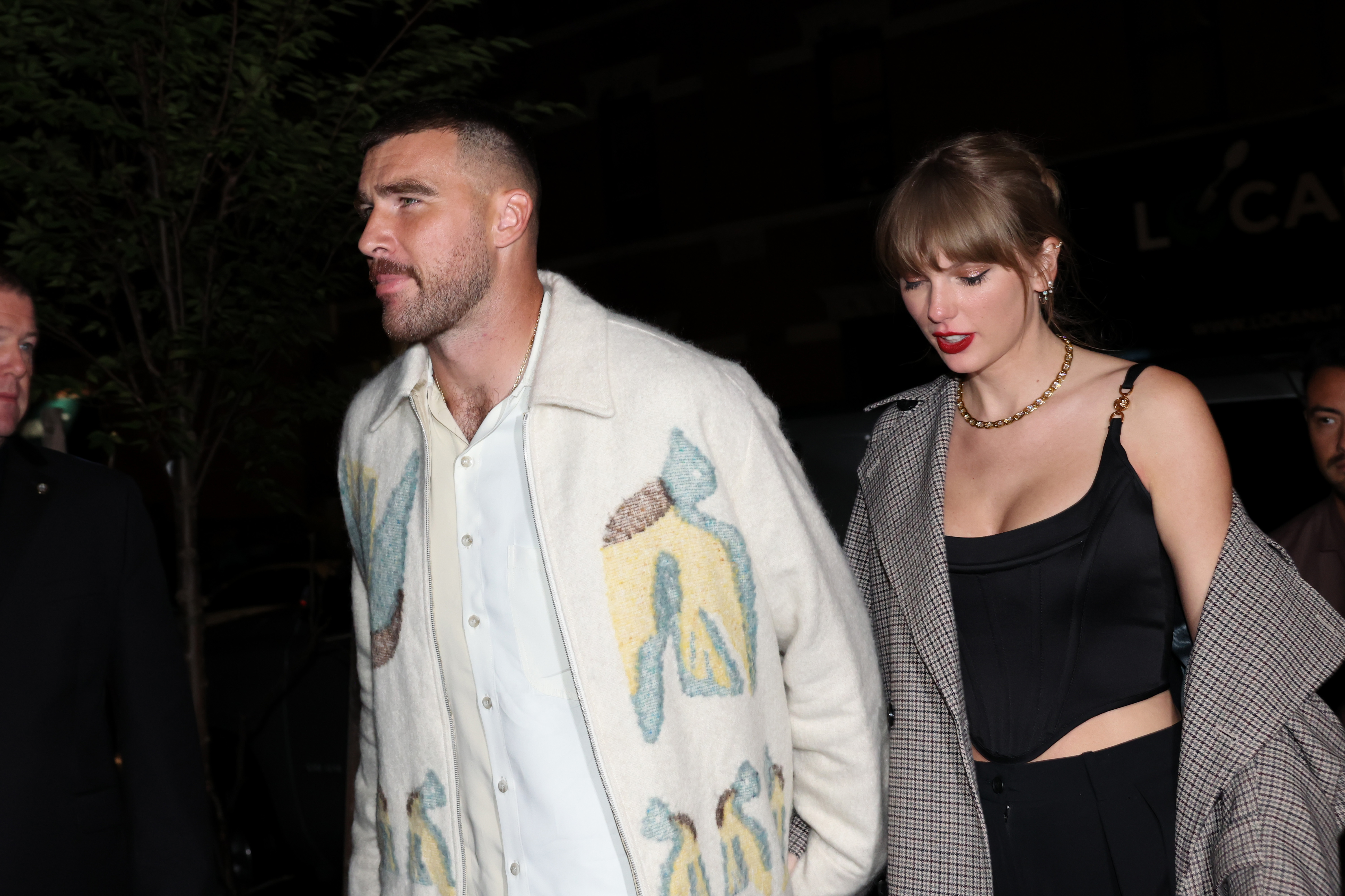 Taylor Swift & Travis Kelce's First Kiss Photo