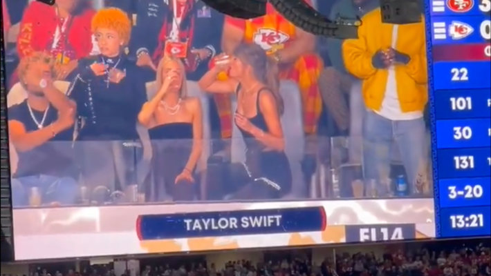 Taylor Swift Chugged Her Drink On The Jumbotron During A Timeout At Super Bowl LVIII