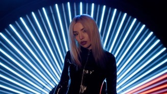 Ava Max’s ‘My Oh My’ Video Shows Her Dancing All Over The Place, Including Atop A Table In A Bar