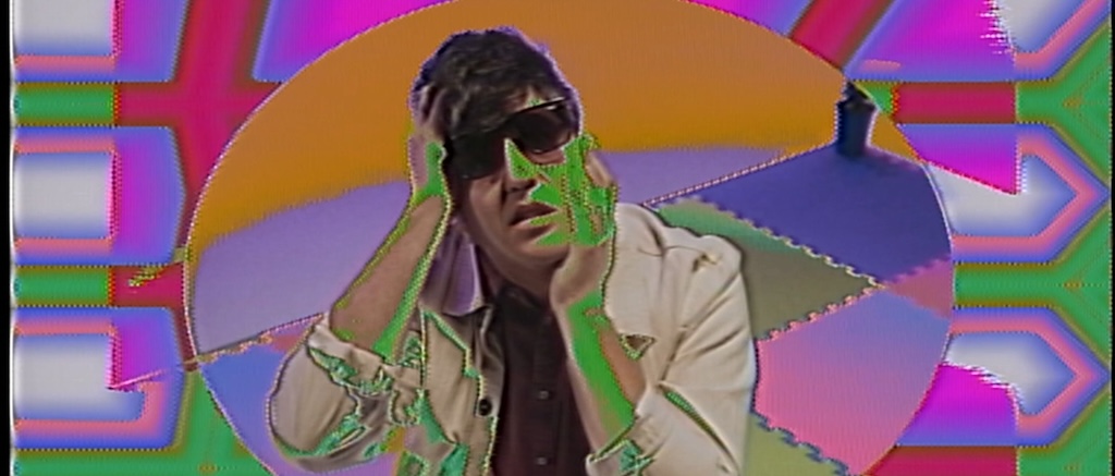Eric_Slick_2_-_Photo_by_Athena_Kulb_CRT_manipulation_by_Grant_Bouvier.jpg FEATURED