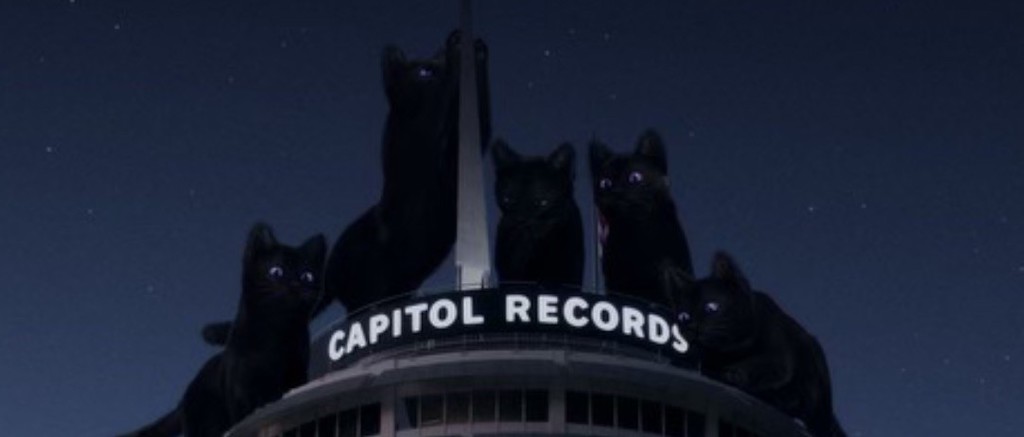 Teddy Park’s THEBLACKLABEL Unveiled K-Pop Girl Group MEOVV With Animated Black Cats Scaling The Capitol Records Tower