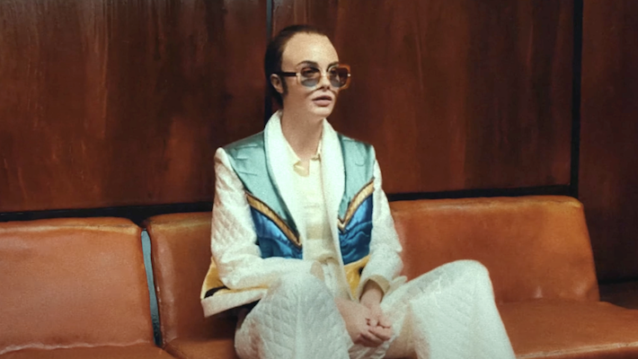 Elton John’s ’Step Into Christmas’ Video Stars Cara Delevingne As Him