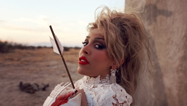 Doja Cat Dodges Dangers And (Literally) Falls In Love In Her Daring ‘Stranger’ Video