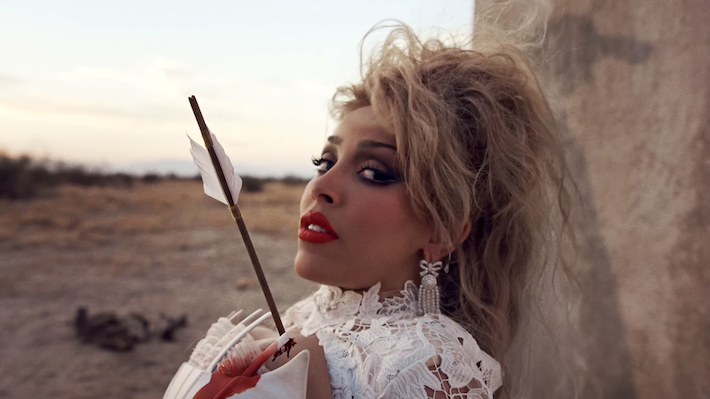 Doja Cat Dodges Dangers And (Literally) Falls In Love In Her Daring ‘Stranger’ Video